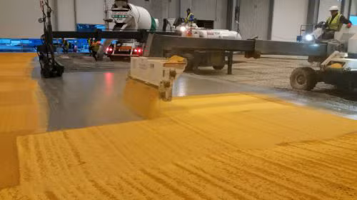 Application colorant durcisseur mécanisée